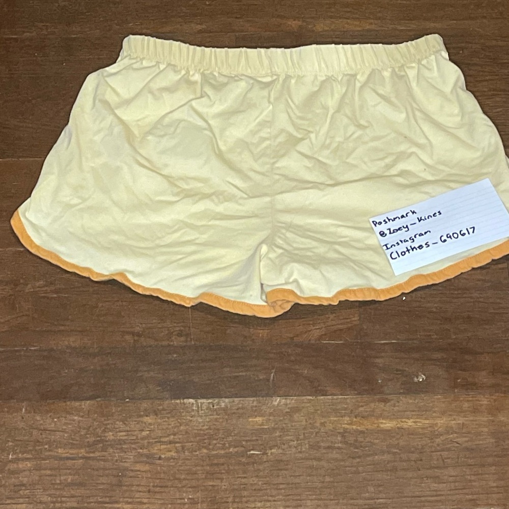 yellow and orange Ford official licensed product, size medium